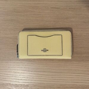 Coach butter yellow zip around wallet grained leather